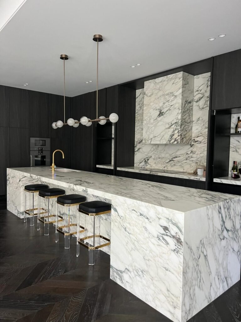 Modern waterfall island Kitchen