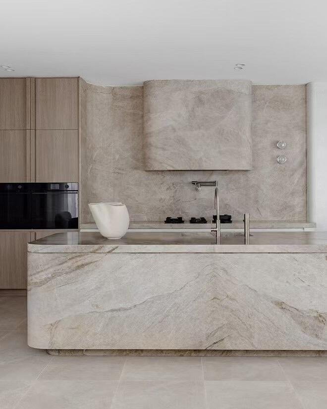 Taj Mahal quartzite kitchen countertops bookmatched