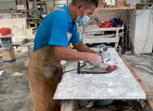 Compare Carrara marble