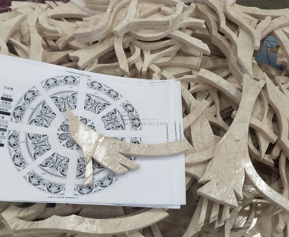 Stone water jet medallions